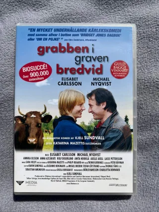 Grabben i graven bredvid